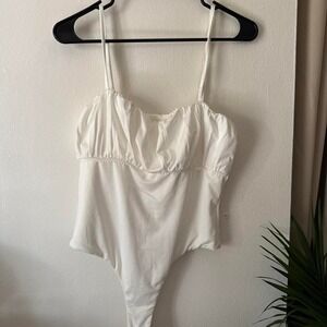 Princess Polly white bodysuit in a US 10